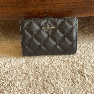 Kate Spade black pillow leather wallet.